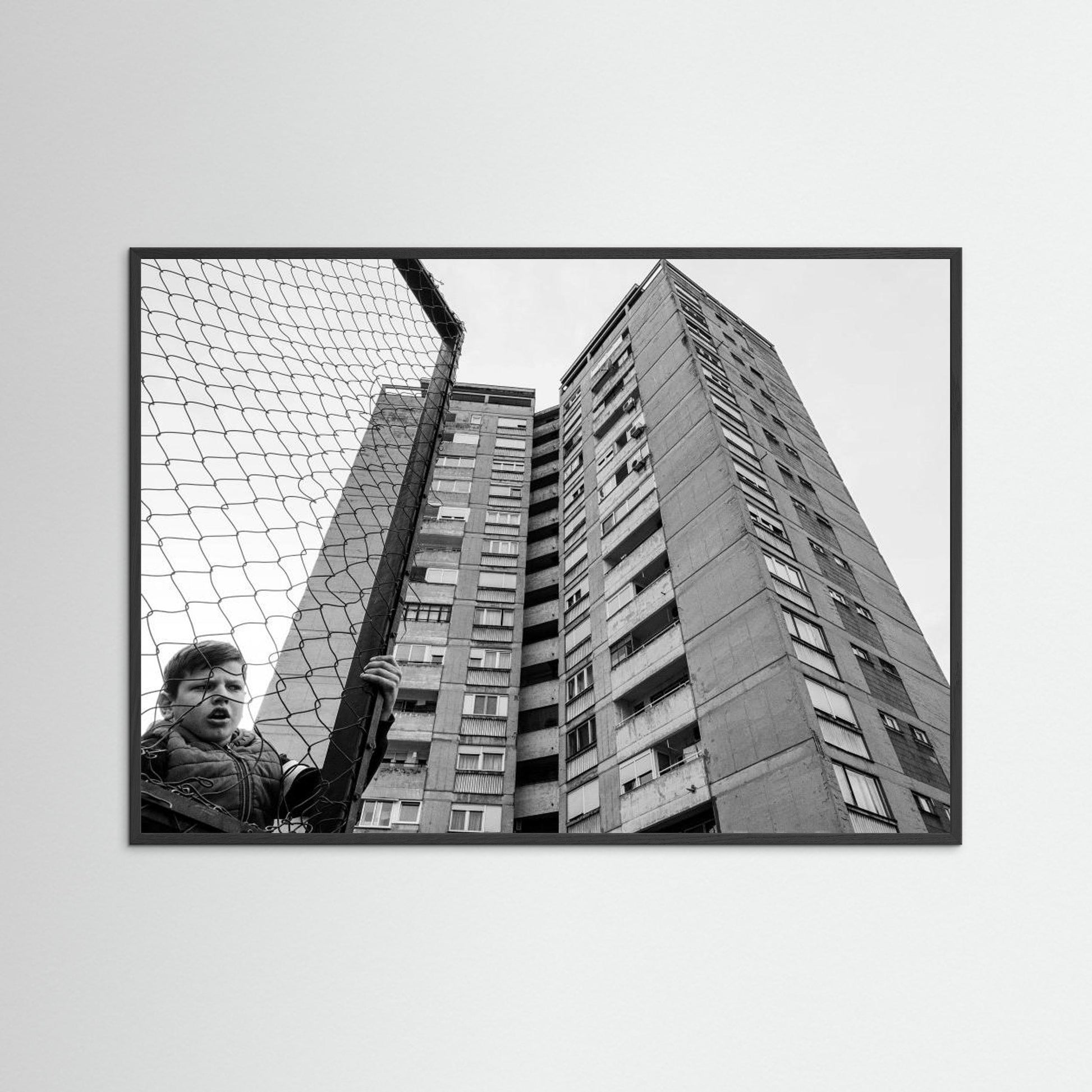 The boy behind the fence by Svetislav Cvetkovic